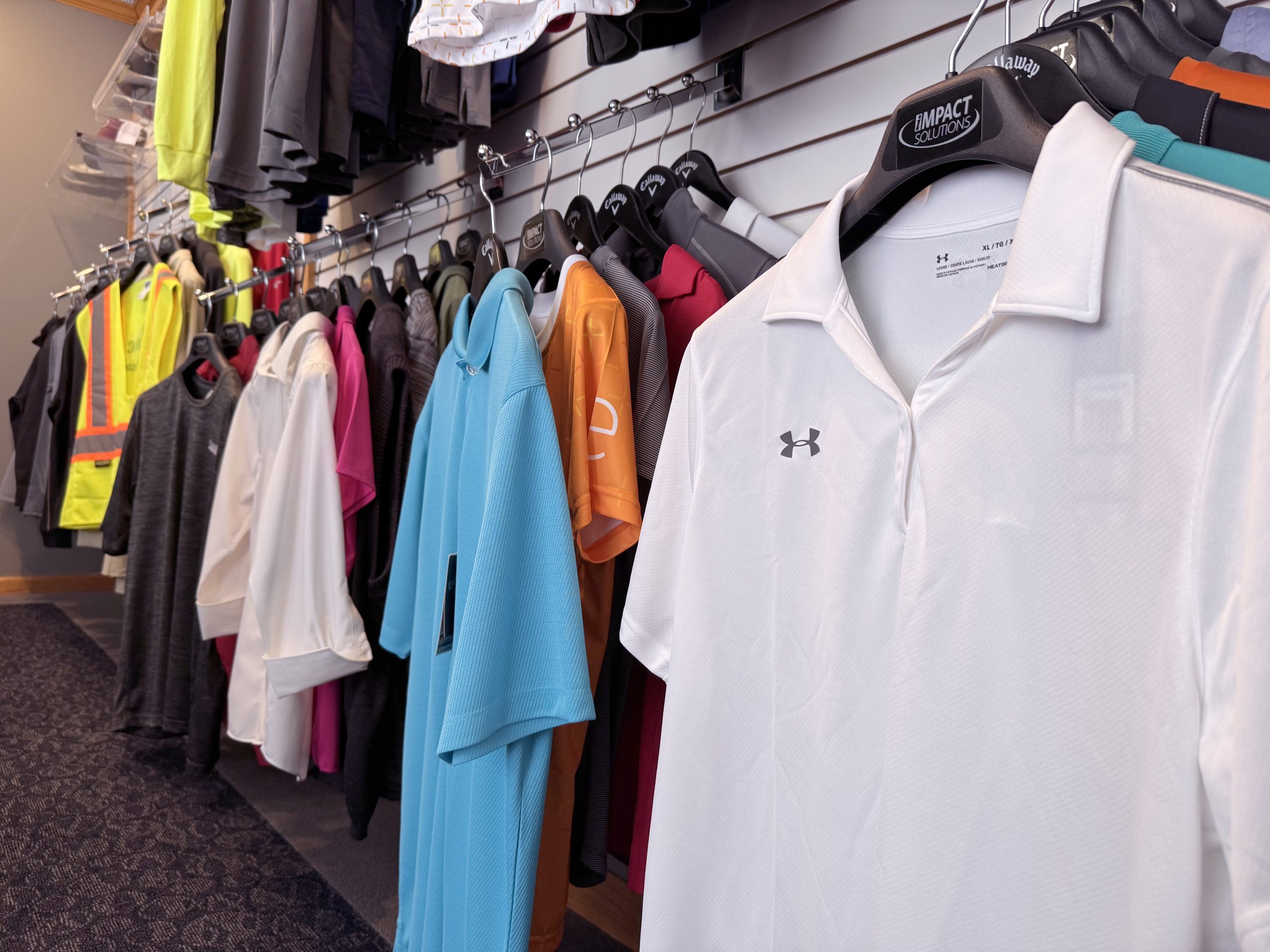Apparel image shirts on racks and hangers shirts on racks and hangers
